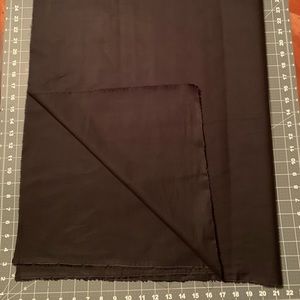 Black polycotton disinfectedwith Lysol and sealed